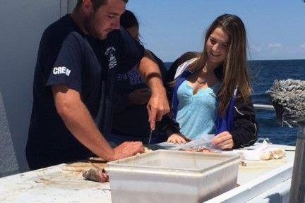 a group of people sitting at a table